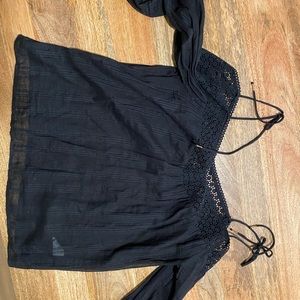 Paige off the should top with ties